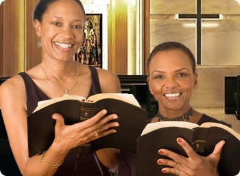 2 women reading the bible in church